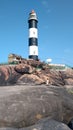 Light house on rock at Indian Beach Royalty Free Stock Photo