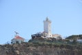 Light house on the rocks at Mossel bay,South Africa. Royalty Free Stock Photo