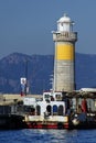 Light house & ship in the port of Cannes