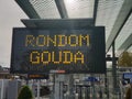 Light information display with text `Rondom Gouda` which mean around Gouda during station closure for maintenance
