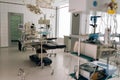Light interior of modern operating room and equipment in hospital, no people. Medical device for surgeon surgical