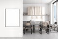 Light kitchen interior with eating table and seats, cooking space. Mockup frame Royalty Free Stock Photo