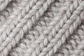 knitted fabric woolen background beige, Knitting pattern from wool Royalty Free Stock Photo