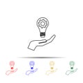 Light lamp bulb with cogwheel gear in hand multi color style icon. Simple thin line, outline vector of team work icons for ui and Royalty Free Stock Photo