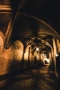 Light from the lamp and the shadows in the mysterious corridor in old dungeon Royalty Free Stock Photo