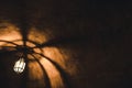 Light from the lamp and the shadows in the mysterious corridor in old dungeon Royalty Free Stock Photo