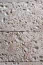 This is a light limestone slab with traces