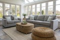 Light Living Room with Grey Sofas and Wicker Poufs Royalty Free Stock Photo