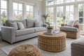 Light Living Room with Grey Sofas and Wicker Poufs Royalty Free Stock Photo
