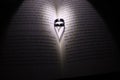 light makes heart in a shadow Royalty Free Stock Photo