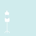 Light mannequin with corset on a light blue background