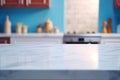 Light marble table with blurred modern blue colored kitchen set, photorealistic blurred bokeh background with copyspace Royalty Free Stock Photo
