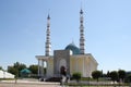 A light mosque with high minarets. Mosque against the blue sky. Royalty Free Stock Photo