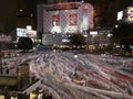 Light motion night scene of people crossing Shibuya intersection