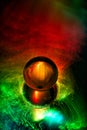Light painting on crystal ball, reflected in mirror. Abstract background. Royalty Free Stock Photo