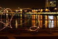 Light painting at night by the river in Puerto Madero