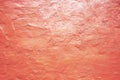 Light pale red coral abstract texture background. Peach pink color. Painted wall with rough plaster. Royalty Free Stock Photo