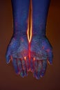 Light through the palms of your hands in ultraviolet, God and religion. Divine light through hand fingers, prophet Muhammad