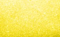 Light pastel yellow, glitter, sparkle and shine abstract background.