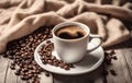 Light photo, in white and beige tones. Cup of hot coffee with steam on a wooden background. Coffee beans. Cozy homely Royalty Free Stock Photo