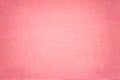 Light pink background from a textile material with wicker pattern, closeup Royalty Free Stock Photo