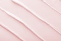 Light pink cosmetic product cream pattern as background
