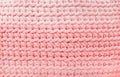 Light pink crochet knitted patterns texture for background , handmade