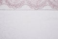 Light pink fabric texture with patterns. Royalty Free Stock Photo