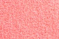 Light pink glitter background with glare. Pink glitter texture. Royalty Free Stock Photo