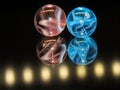 Light pink and light blue glass marbles. Royalty Free Stock Photo