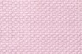 Light pink textile background with checkered pattern, closeup. Structure of the fabric macro. Royalty Free Stock Photo