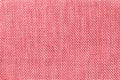 Light pink textile background with checkered pattern, closeup. Structure of the fabric macro. Royalty Free Stock Photo