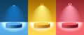 Light podium with hanging lamps, spot lights. Abstract empty room with set of red, yellow and blue color cylinder stand Royalty Free Stock Photo