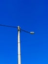 light pole with blue sky. minimalist photo