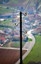 Light pole with three wires of the power line to supply electric Royalty Free Stock Photo