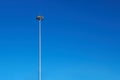 Light poles, copy space. LED light post for parking lot, blue sky background. Lamppost for street lighting at night