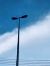 Light poles. Street lamp against blue sky background Royalty Free Stock Photo