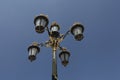 Light post with blue sky background. Vintage outdoor street lights. Cast iron lamp Victorian large lantern Royalty Free Stock Photo