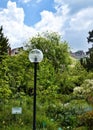 Light post in Hermannshof garden Royalty Free Stock Photo