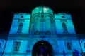 Light projections on Taronga Zoo entrance building. Vivid Sydney light festival