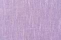 The light purple background from a textile material. Fabric with natural texture Royalty Free Stock Photo