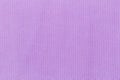 The light purple background from a textile material. Fabric with natural texture Royalty Free Stock Photo