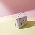 Light Purple Handbag on Yellow Surface Royalty Free Stock Photo
