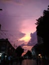 Light purple sunset sky over the street in the old town. Vertical photo Royalty Free Stock Photo