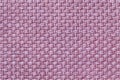 Light purple textile background with checkered pattern, closeup. Structure of the fabric macro. Royalty Free Stock Photo