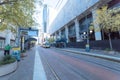 Light rail train station with passenger waiting in downtown Dall