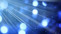Light rays and bokeh circles blue background