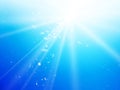 Light rays and dust blue sky background Royalty Free Stock Photo