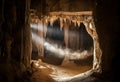 Light rays entering from a narrow cave opening, dust floating in loop Royalty Free Stock Photo