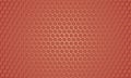 Light red metallic hexagon textured steel background. Red carbon fiber texture. Royalty Free Stock Photo